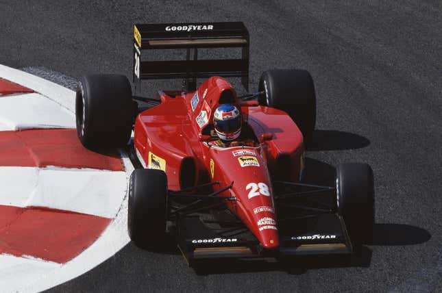 A photo of Ivan Capelli driving a Ferrari F92A Formula 1 car, viewed from the front and slightly above.