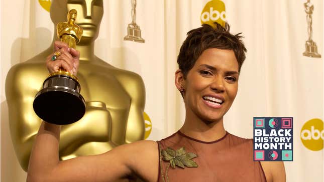 Halle Berry poses with her Actress in a Leading Role Oscar for Monster’s Ball. 