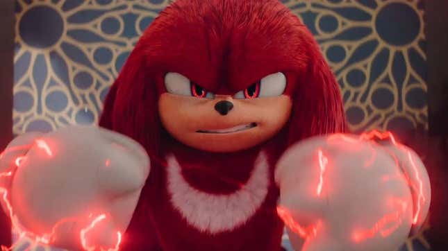 Knuckles charges up his fists.