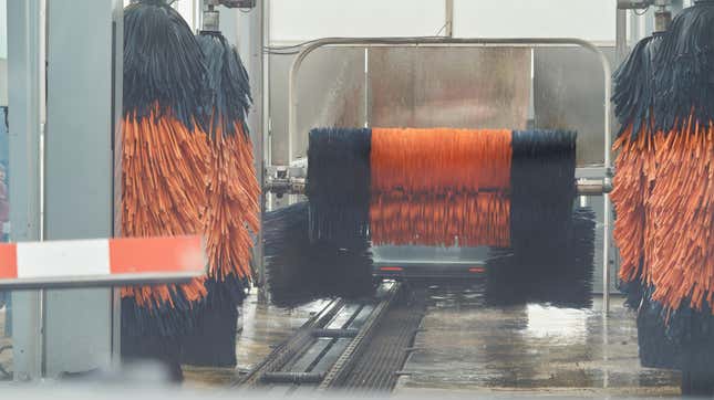 Inside view of a car wash brushes machine. Brushes of a car wash room.