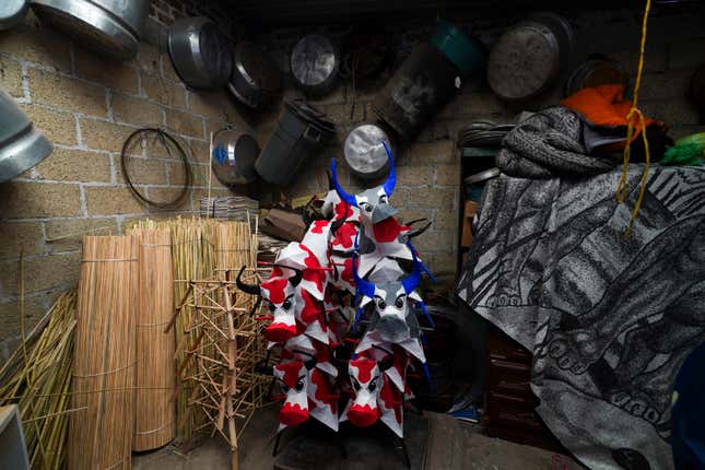 Paper-mache bulls to be stuffed with fireworks are stored in a warehouse ahead of the annual festival honoring Saint John of God, the patron saint of the poor and sick whom fireworks producers view as a protective figure, in Tultepec, Mexico, Thursday, March 7, 2024. (AP Photo/Marco Ugarte)