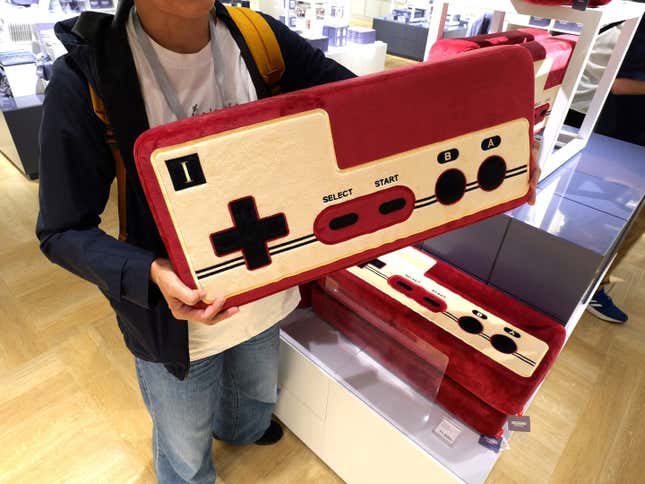 Photos show merch found at the Nintendo museum.