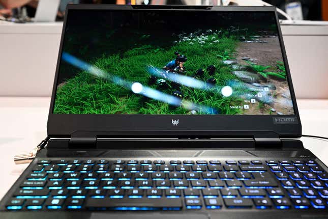 An Acer Predator Helios 300 laptop with eye tracking for glasses free 3D video gaming is displayed at the Microsoft Inc. booth during the Consumer Electronics Show (CES) in Las Vegas, Nevada on January 6, 2023. 