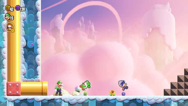 Luigi se tient à côté de Yoshi et Toad.
