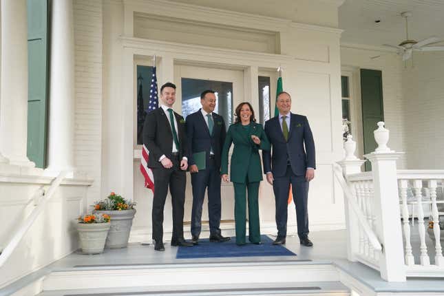 US Vice President Kamala Harris (2nd R) and Second Gentleman Doug Emhoff (R) greet Irish Taoiseach Leo Varadkar (2nd L) and his partner Matthew Barrett ahead of a St. Patrick’s Day breakfast at the Vice President’s residence in the US Naval Observatory in Washington, DC, on March 17, 2023. 