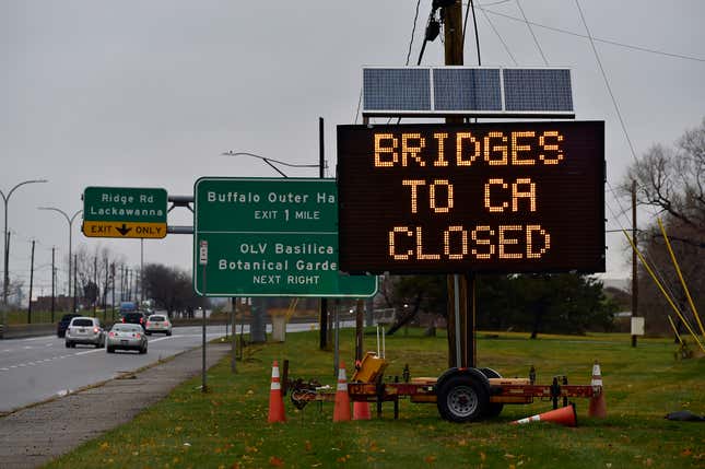 Picture of a road sign saying, "bridges to Canada Closed" following the fatal accident where Mr. Villani crashed into a vehicle inspection booth at the Niagara Falls and Canada border.