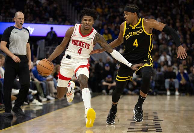 Nov 20, 2023; San Francisco, California, USA; Houston Rockets guard Jalen Green (4) dribbles against Golden State Warriors guard Moses Moody (4) during the third quarter at Chase Center.