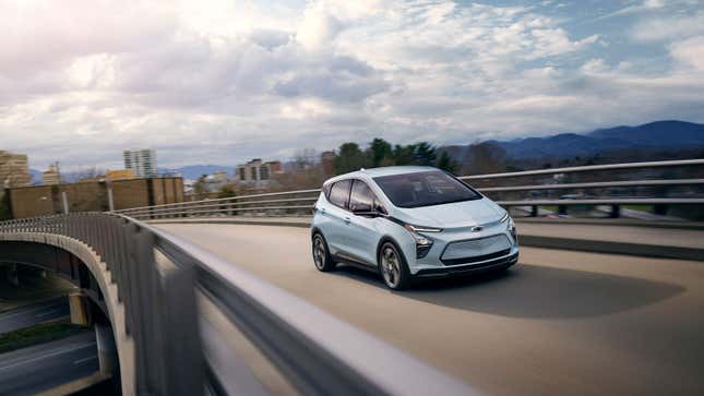 A photo of a pale blue Chevrolet Bolt EV. 