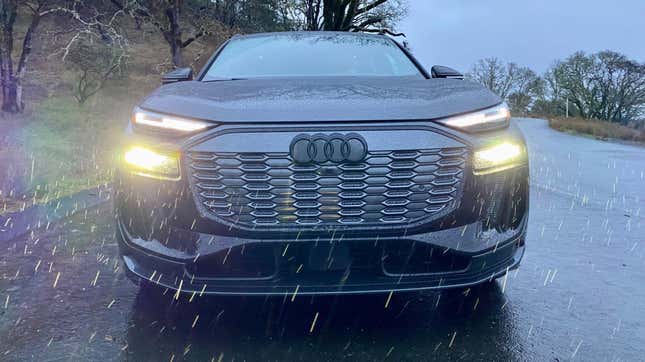 A close up of a gray Audi SQ6 in the rain 