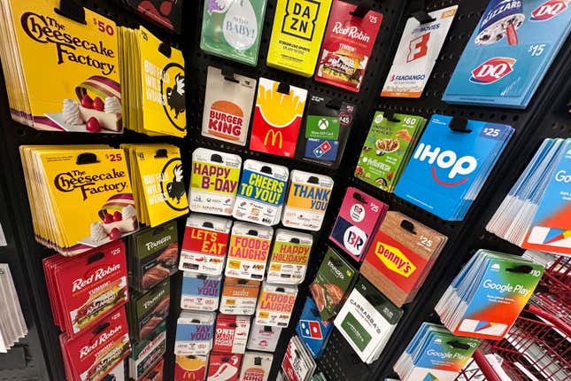 Gift cards are displayed at a Target store, in New York, Thursday, Dec. 21, 2023. Americans are expected to spend nearly $30 billion on gift cards this holiday season, according to the National Retail Federation. Restaurant gift cards are the most popular, making up one-third of those sales. (AP Photo/Richard Drew)