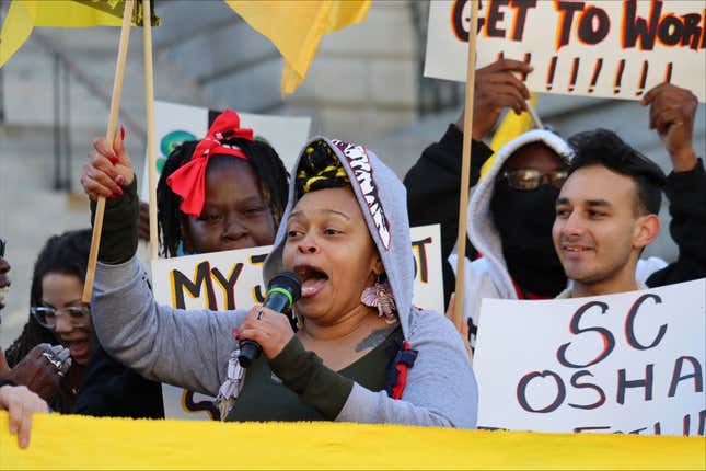 Shae Parker, a former Waffle House employee, rallies fellow Union of Southern Service Workers members outside the State House in Columbia, S.C. on Thursday, Dec. 7, 2023. Labor organizers petitioned the federal government to take control of workplace safety oversight from South Carolina regulators. (AP Photo/James Pollard)