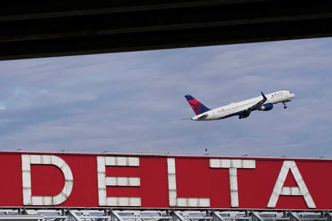 FILE - A Delta Air Lines plane takes off from Hartsfield-Jackson Atlanta International Airport, Nov. 22, 2022, in Atlanta. In a statement released Wednesday, Nov. 1, 2023, Delta Air Lines said the pilot accused of threatening to shoot the plane&#39;s captain during a flight no longer works for the airline, and federal officials say his authority to carry a gun on board was revoked. (AP Photo/Brynn Anderson, File)