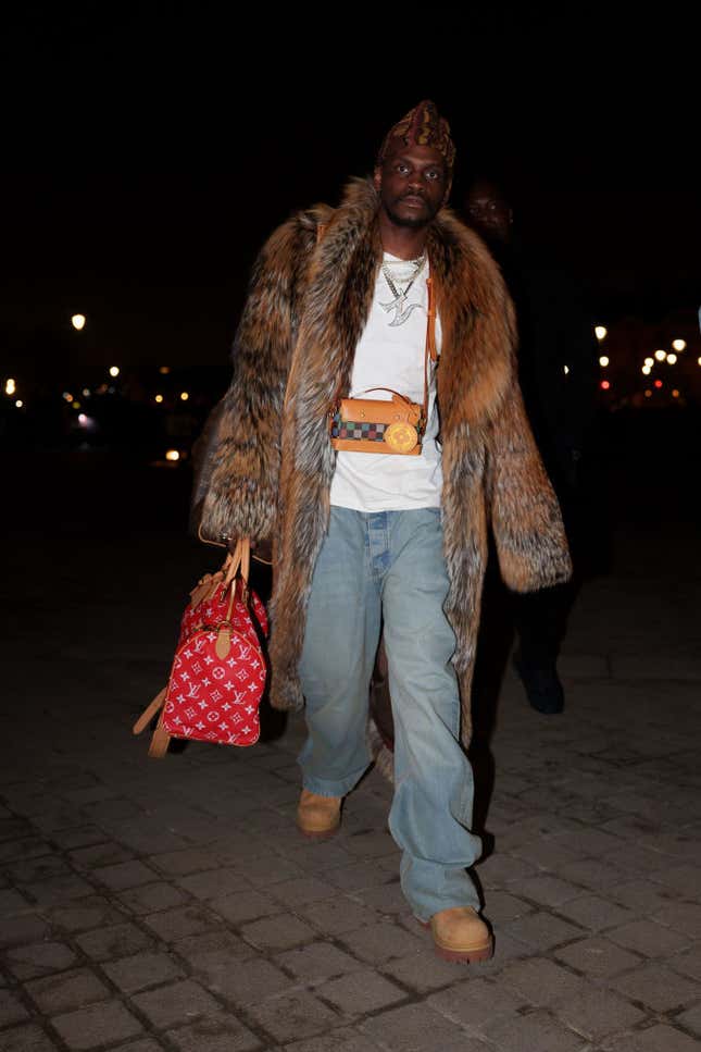 Image for article titled Fly Black Celeb Looks at the Louis Vuitton Show at Paris Fashion Week