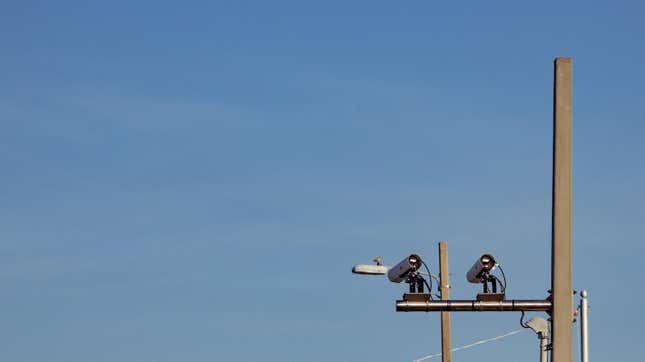 Automated license plate reader (ALPR/LPR) cameras scan license plates of cars crossing into Pensacola Beach, Florida