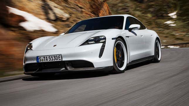 A photo of a white Porsche Taycan Turbo S. 