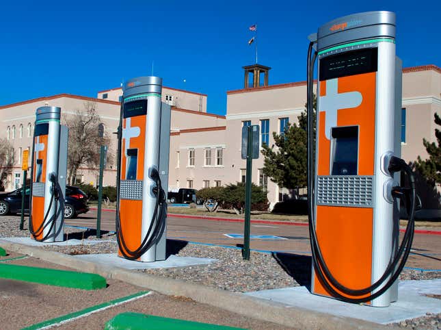 FILE - This Dec. 21, 2020 image provided by the New Mexico General Services Department shows some of the recently installed electric vehicle charging stations at the Bataan Memorial Building in Santa Fe, N.M. Mandates for auto dealers to provide an increasing number of electric vehicles for sale across New Mexico will remain in place as state regulators on Friday, April 5, 2024, denied an effort to derail implementation of the new rules pending a legal challenge. (Thom Cole/New Mexico General Services Department, via AP)