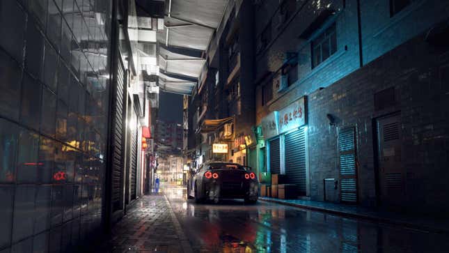 A car drives through a street at night