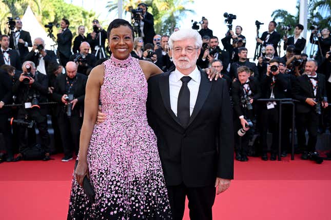 CANNES, FRANCE - MAY 25: George Lucas and Mellody Hobson attend the Red Carpet of the closing ceremony at the 77th annual Cannes Film Festival at Palais des Festivals on May 25, 2024 in Cannes, France. 