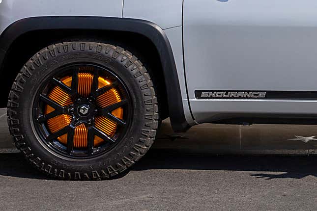 he new Endurance all-electric pickup truck on display on the south lawn of the White House on September 28, 2020 in Washington, DC. They bought the old GM Lordstown plant in Ohio to build the Endurance all-electric pickup truck, inside those four wheels are electric motors similar to electric scooters.