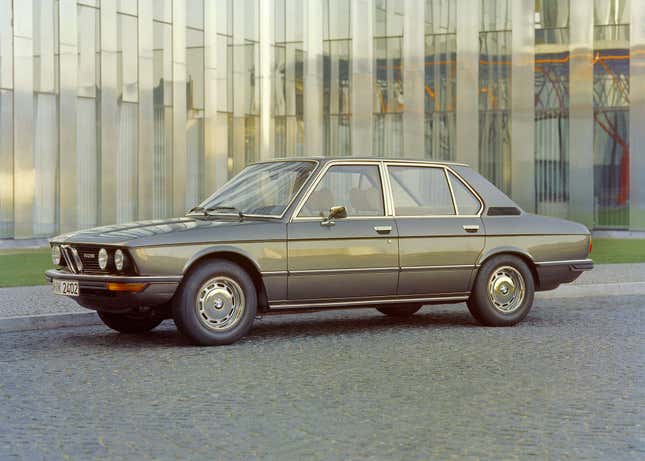 Front 3/4 view of a grey E12 BMW 5 Series