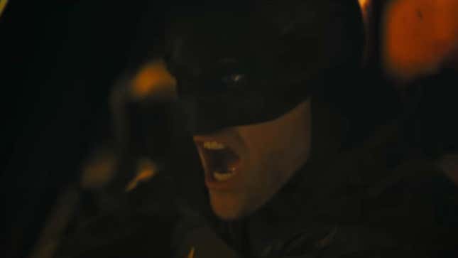 Robert Pattinson's Batman roars in anger as he slams the gas in a scene from The Batman.