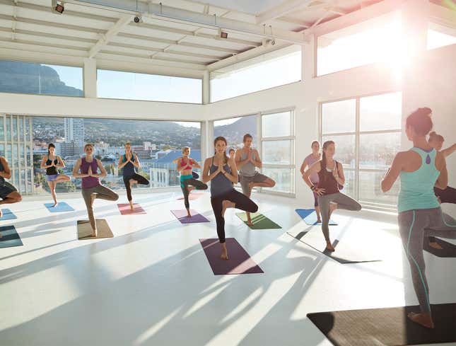 Image for article titled Popular New Fitness Class Standing On One Leg While EDM Blasts