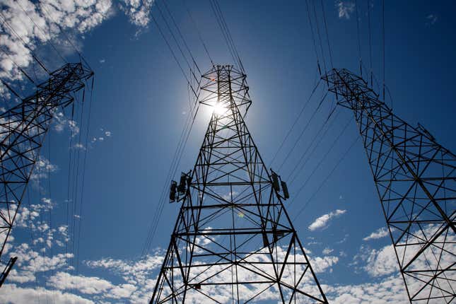  The sun shines over towers carrying electrical lines on August 30, 2007, in South San Francisco, California.