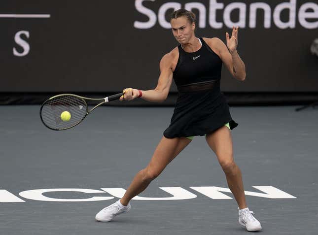 Nov 3, 2023; Cancun, Mexico;  Aryna Sabalenka returns a shot during her match against Elena Rybakina (KAZ) on day six of the GNP Saguaros WTA Finals Cancun.