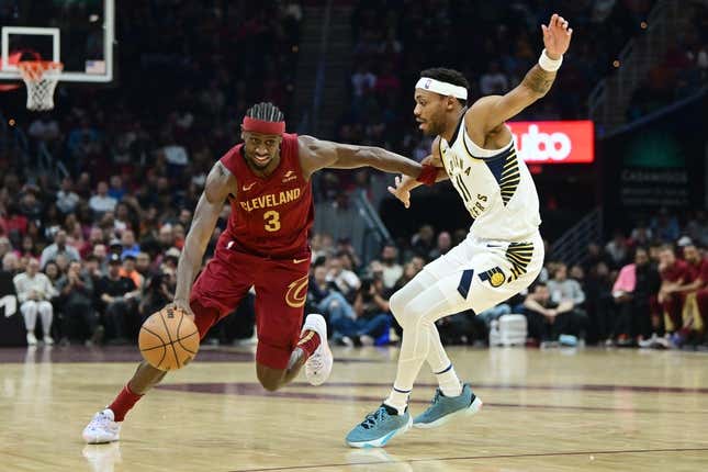 Oct 28, 2023; Cleveland, Ohio, USA; Cleveland Cavaliers guard Caris LeVert (3) drives to the basket against Indiana Pacers forward Bruce Brown (11) during the first half at Rocket Mortgage FieldHouse.