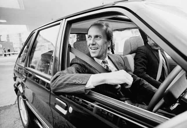 British Conservative Party politician and life peer Norman Tebbit driving an Austin Maestro car, UK, 16th September 1983
