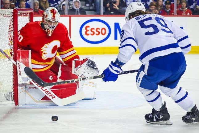 Jan 18, 2024; Calgary, Alberta, CAN; Calgary Flames goaltender Dan Vladar (80) guards his net against Toronto Maple Leafs left wing Tyler Bertuzzi (59) during the first period at Scotiabank Saddledome.