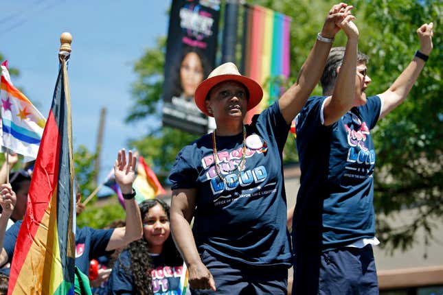 Chicago Mayor Lori Lightfoot, left, and her wife, Amy Eshleman, participate in the 51st Chicago Pride Parade in Chicago, Sunday, June 26, 2022. 