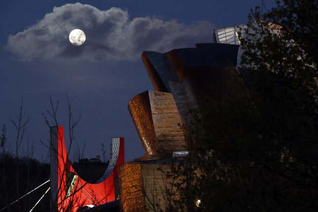 A view of the moon over the Guggenheim Museum in Bilbao, Spain.