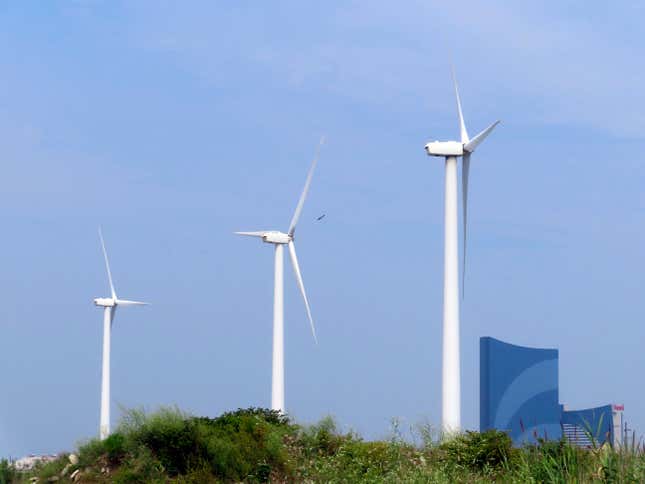 FILE - Land-based wind turbines in Atlantic City, N.J., turn on July 20, 2023. Two major offshore wind power projects are taking steps forward in New Jersey as the owners of one project agreed to bring the federal government in on their environmental monitoring plans at an earlier stage than has ever been done, and federal regulators said plans for another project are not expected to kill or seriously injure marine life. They come as New Jersey continues to grow as a hub of opposition to offshore wind projects from residents&#39; groups and their political allies, mostly Republicans. (AP Photo/Wayne Parry, File)