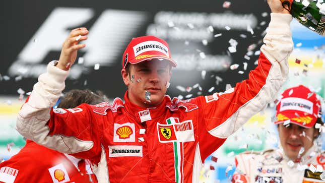 Kimi Räikkönen celebrates on the podium after winning the 2007 Brazilian Grand Prix and drivers’ championship.