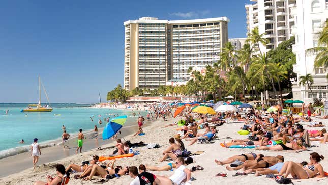 Image for article titled Hawaiian Travel Ad Boasts Sandy White Tourists As Far As The Eye Can See