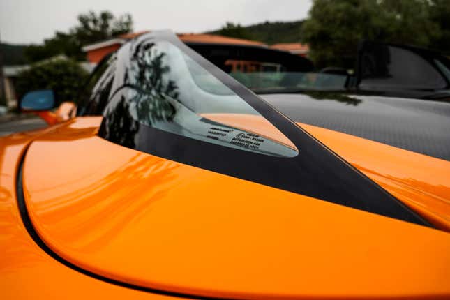 Rear buttress of an orange McLaren Artura Spider