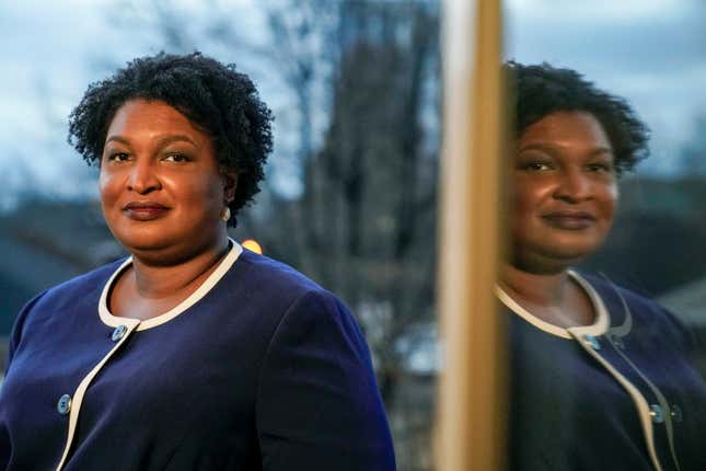 Georgia gubernatorial Democratic candidate Stacey Abrams poses for a photo during an interview with The Associated Press on Dec. 16, 2021, in Decatur, Ga. Georgia’s 2022 election field will solidify this week as major party candidates officially qualify. At the top of the ticket are races for governor and U.S. senator. On the Democratic side, Stacey Abrams has no announced opposition for governor. Incumbent Republican Brian Kemp has multiple challengers including former U.S. Sen. David Perdue. 