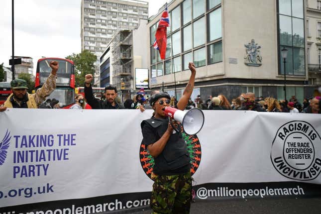 Activist Sasha Johnson uses a megaphone at the head of a gathering in Westbourne Park to taking part in the inaugural Million People March march from Notting Hill to Hyde Park in London on August 30, 2020.