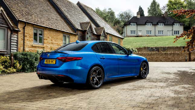 A photo of a blue Alfa Romeo Giulia sedan. 