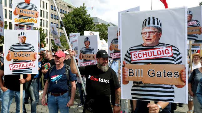 People attend a protest rally in Berlin, Germany, Saturday, Aug. 29, 2020.