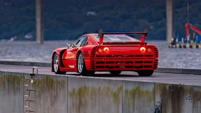 Photo of a GTO Evoluzione parked on a dock, viewed from the rear.