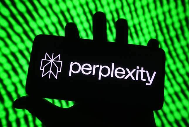 Perplexity AI logo is seen on a smartphone screen held by a hand in front of a neon green backdrop