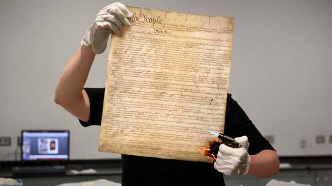 Image for article titled National Archives Intern Tasked With Singeing Edges Of Constitution To Make It Look Old