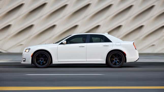 A photo of a white Chrysler 300 sedan. 