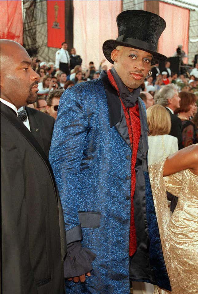 Dennis Rodman arrives for the 69th Academy Awards ceremony at the Shrine Auditorium in Los Angeles, 24 March.