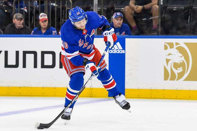 Oct 5, 2023; New York, New York, USA;  New York Rangers left wing Artemi Panarin (10) shoots the puck against the Boston Bruins during the third at Madison Square Garden.