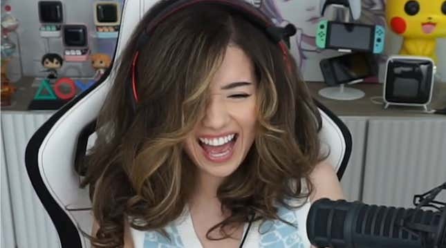 Pokimane laughs while streaming.