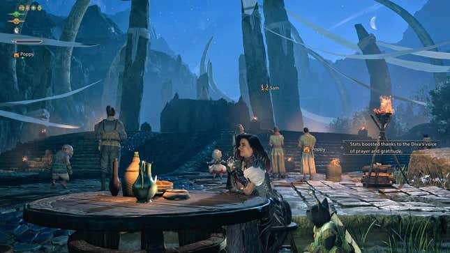 A hunter sits at a table after having their stats boosted by the Diva’s performance.