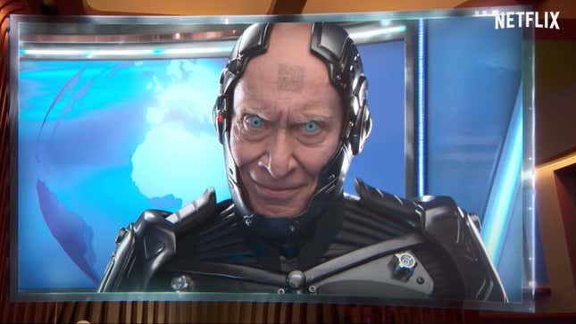A bald android with piercing sky-blue eyes and a disconcerting smile addresses people on TV.